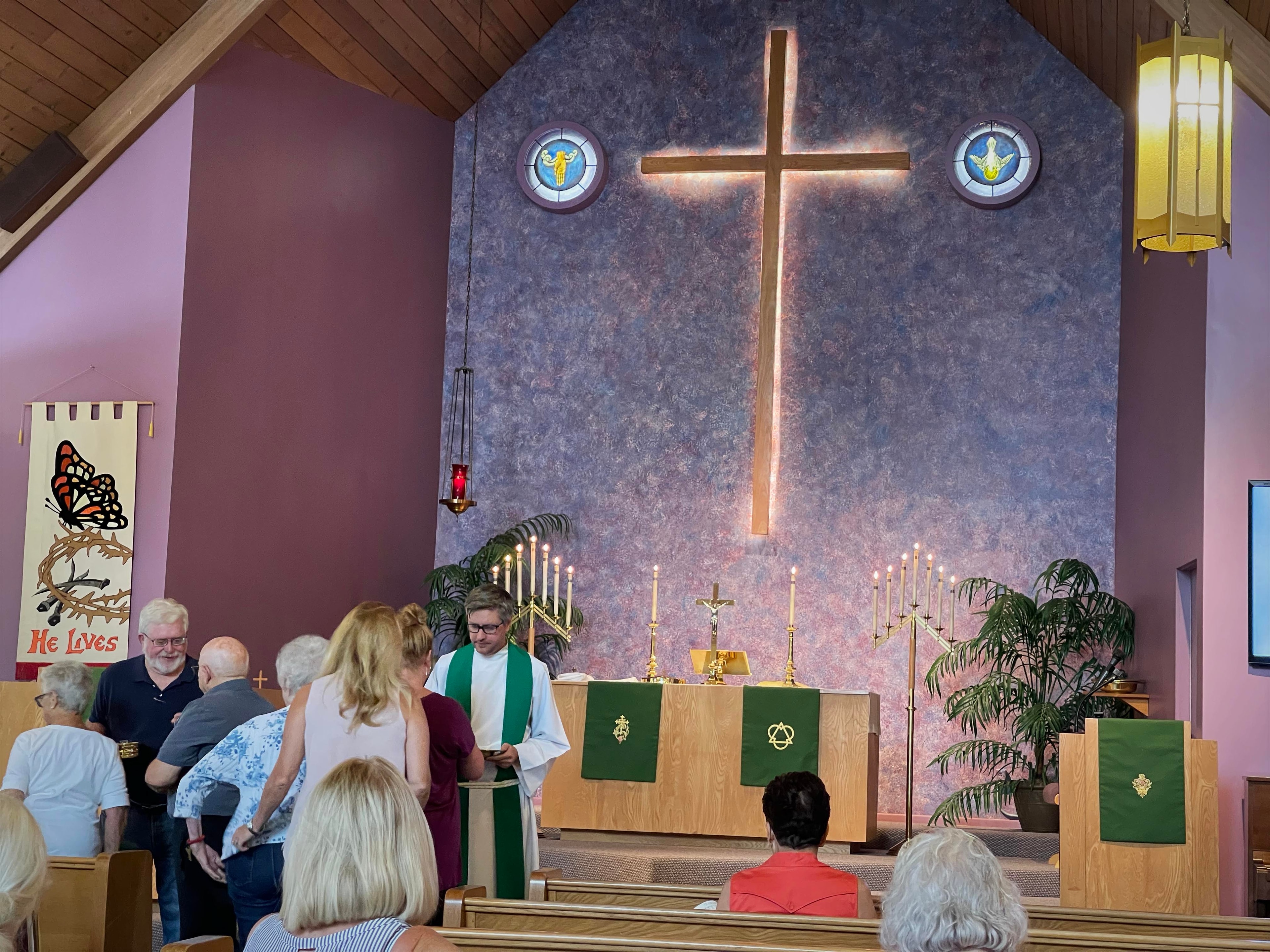 Congregation gathered at the altar during service