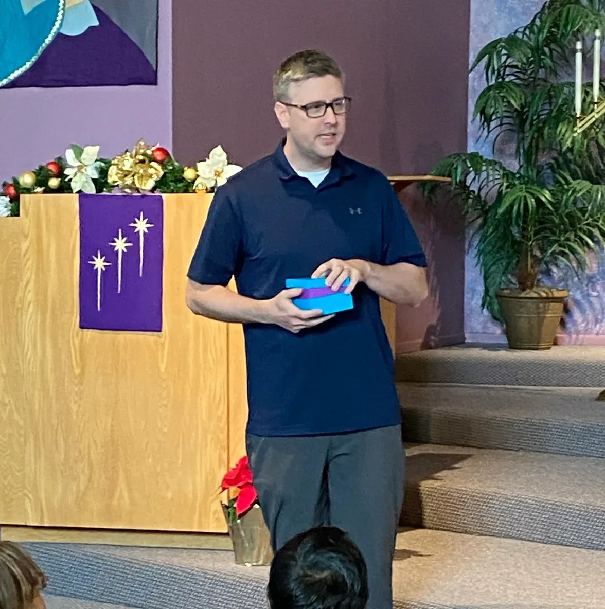 Pastor Scott speaking at the altar