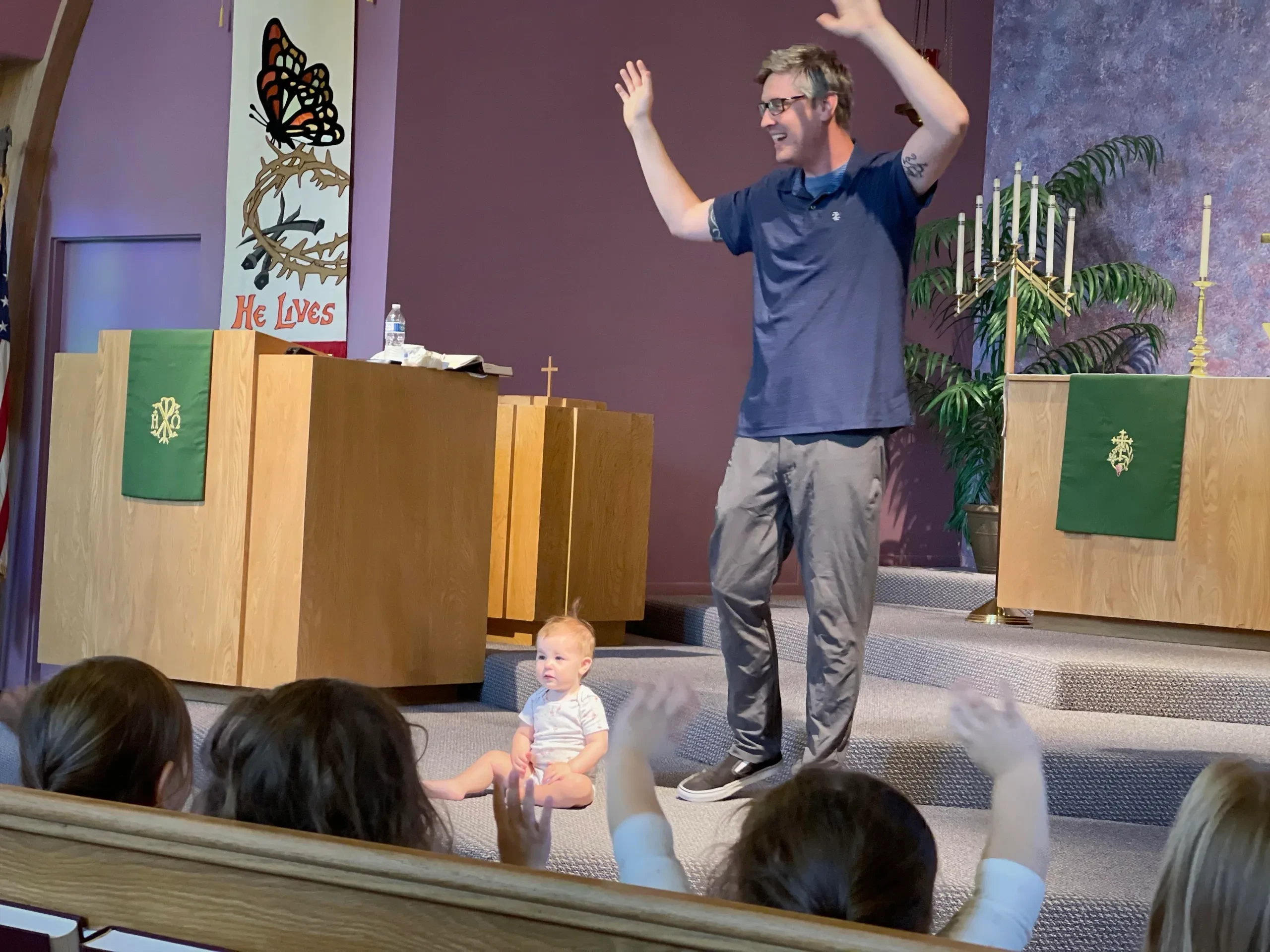 Pastor Scott celebrating with congregation